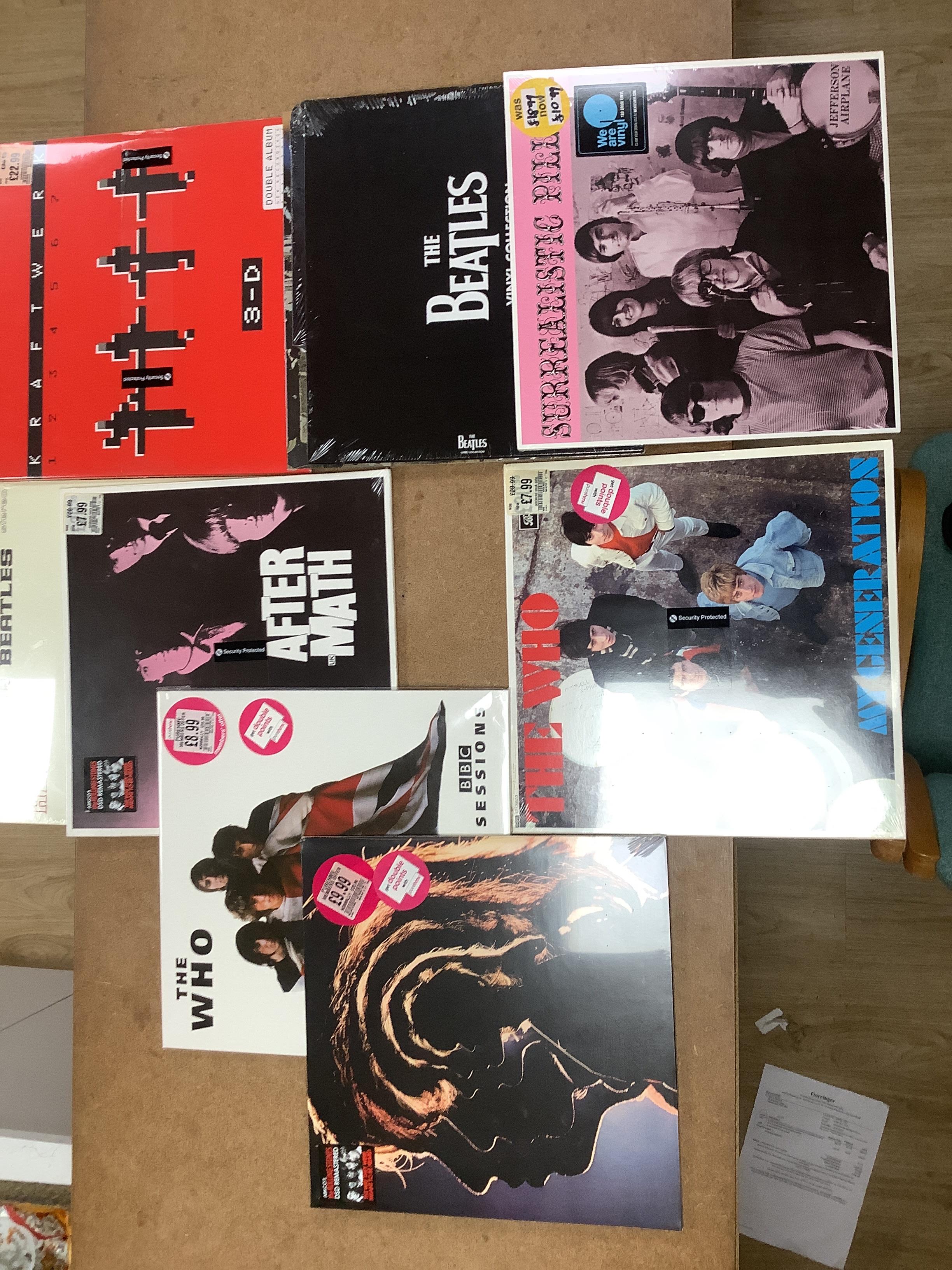 Nineteen sealed album re pressings, 1960’s & 1970’s rock to include The Beatles, David Bowie, Rolling Stones etc.